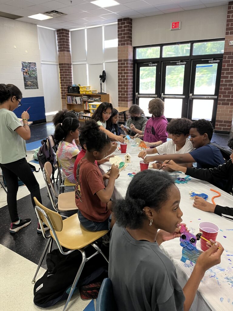 Kids working on a project at a table